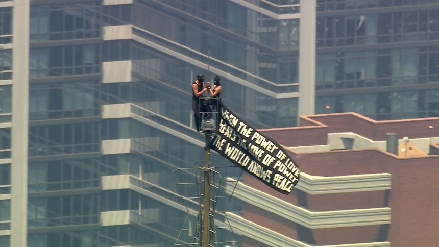 The Empire State Building Spire Stunt: Daredevils Arrested After Unauthorized Proposal 1 Empire State Building